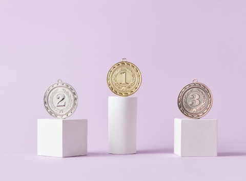 Coins on winner podium