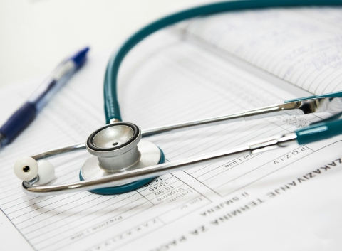 Stethoscope over list of patient names 