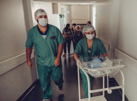 Nurses walking through hospital hallway