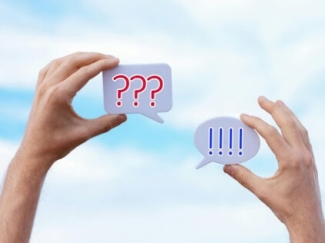 hands holding text bubbles saying "!!!" and "???"